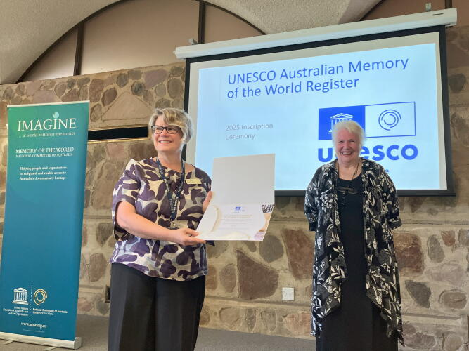 ANU University Archivist Kathryn Dan and former University Librarian Roxanne Missingham at the ceremony. Kathryn was receiving the inscription certificate for ANU Archives's Tooth & Co collection.